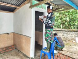 Satgas TMMD Ke-129 Mulai Plamir Dinding MCK dan Tempat Wudhu Langgar Nurul Fajri